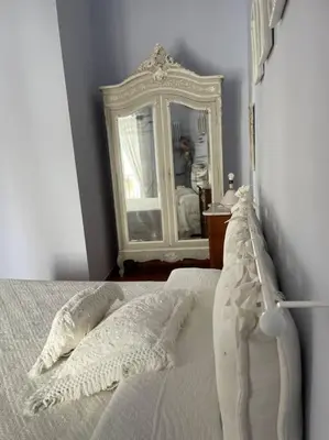 Letto o letti in una camera di Casa da “Nonna Iolanda” Napoli centro storico