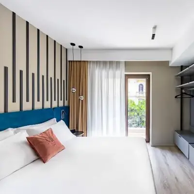 MH SUITES Plebiscito