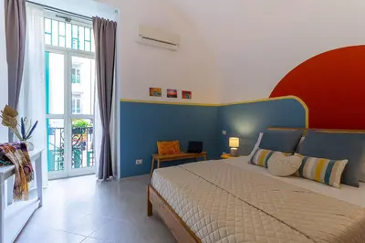 Letto o letti in una camera di Vivaldo Suite SpaccaNapoli
