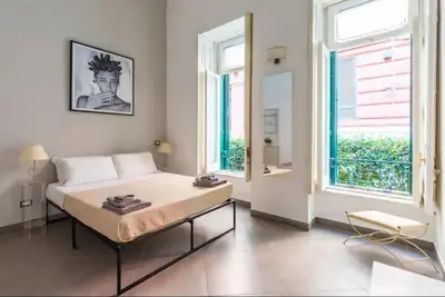 Letto o letti in una camera di Napoli Relax Rooms Chiaia - Mergellina - Posillipo