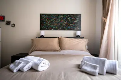 Letto o letti in una camera di Stay Soft Apartment Napoli Balcone, Ascensore e 2 Camere nel Cuore del Centro Storico