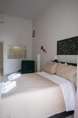 Letto o letti in una camera di Stay Soft Apartment Napoli Balcone, Ascensore e 2 Camere nel Cuore del Centro Storico