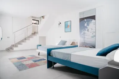 Letto o letti in una camera di Vista Napoli ''Il nuovo appartamento''