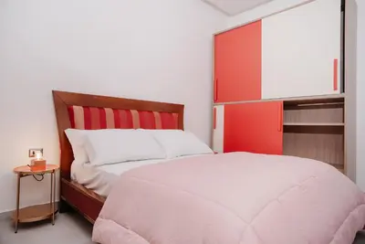 Letto o letti in una camera di Vista Napoli ''Il nuovo appartamento''
