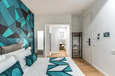 Letto o letti in una camera di Nibla's Room Napoli