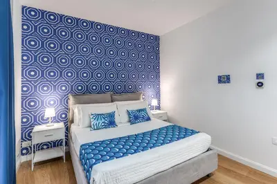 Letto o letti in una camera di Nibla's Room Napoli