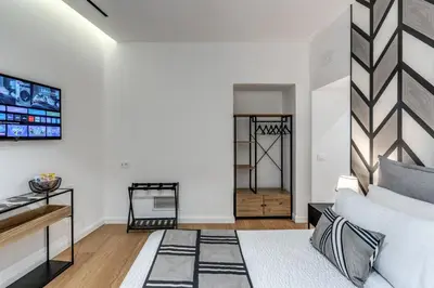 Letto o letti in una camera di Nibla's Room Napoli