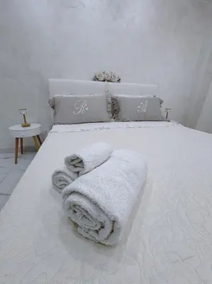Letto o letti in una camera di La casetta di nanny