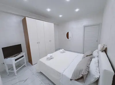 Letto o letti in una camera di La casetta di nanny