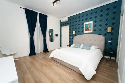 Letto o letti in una camera di 5 Urban Garden House