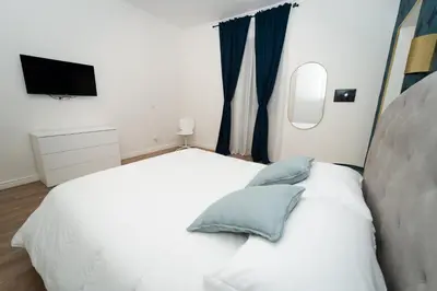 Letto o letti in una camera di 5 Urban Garden House