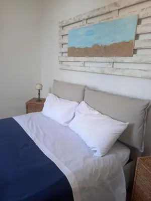 Letto o letti in una camera di 99 Scalini