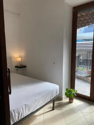 Letto o letti in una camera di Camera matrimoniale con terrazzo