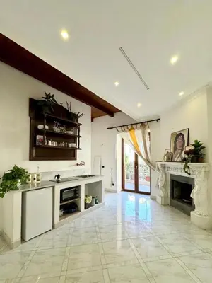 Cucina o angolo cottura di Camera matrimoniale con terrazzo
