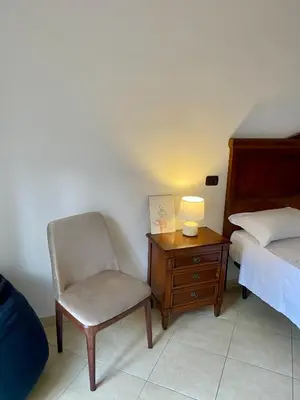 Letto o letti in una camera di Camera matrimoniale con terrazzo