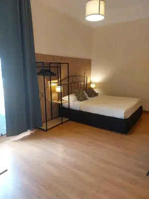 Letto o letti in una camera di DOMUS SCHIPA