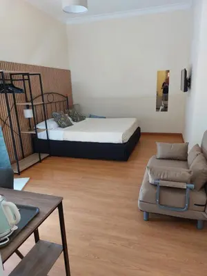 Letto o letti in una camera di DOMUS SCHIPA