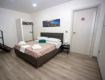 Letto o letti in una camera di NA City Rooms