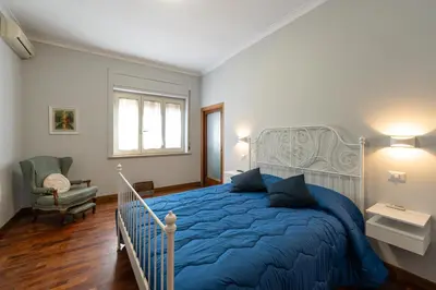 Letto o letti in una camera di Donna Giovannina
