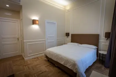 Letto o letti in una camera di Antica Dimora Pessina