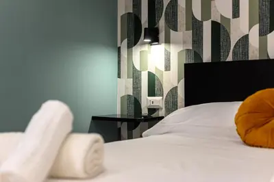 Letto o letti in una camera di La Stanza del Principe