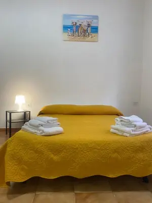 Letto o letti in una camera di Donna Rita