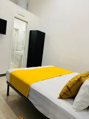 Letto o letti in una camera di Art Suite San Liborio