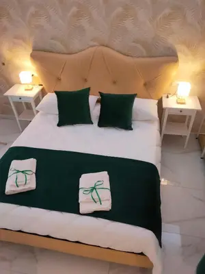 Letto o letti in una camera di Napoli Sogno Infinito