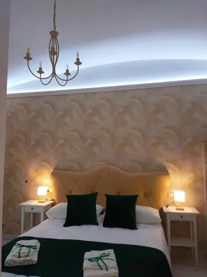 Letto o letti in una camera di Napoli Sogno Infinito