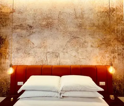 Letto o letti in una camera di Le Dimore di Lorenzo