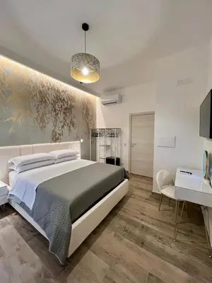 Letto o letti in una camera di Le Dimore di Lorenzo