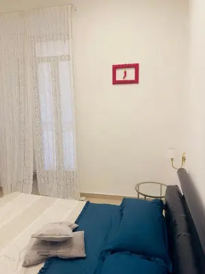 Letto o letti in una camera di Casa Luisa2