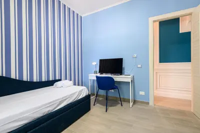 Letto o letti in una camera di Via Nuova Marina 121 - Appartamento 1