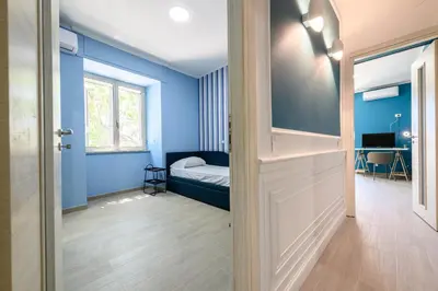 Letto o letti in una camera di Via Nuova Marina 121 - Appartamento 1