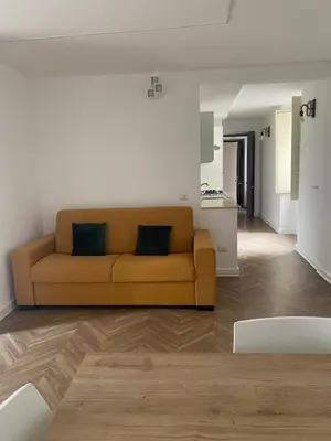 Area soggiorno di Dora House Napoli