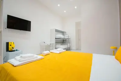 Letto o letti in una camera di B&B Oasi - Metro Montesanto, Centro Storico