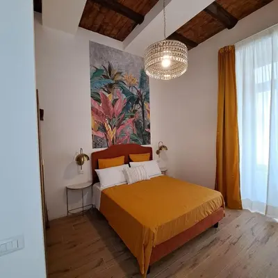 Letto o letti in una camera di Domus Sirena