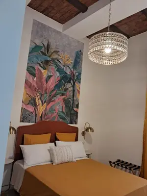 Letto o letti in una camera di Domus Sirena