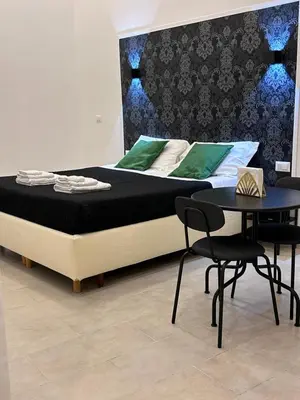 Letto o letti in una camera di Olina residence 2