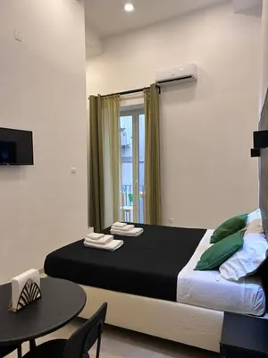 Letto o letti in una camera di Olina residence 2
