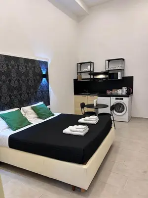 Letto o letti in una camera di Olina residence 2