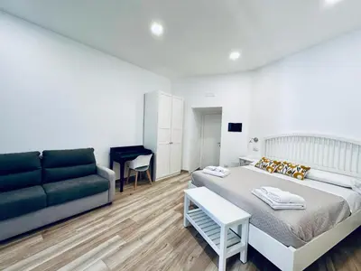 Letto o letti in una camera di B&B Lara's Home by I Borbone