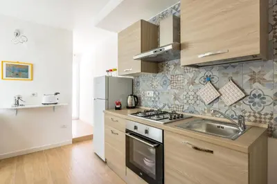 Cucina o angolo cottura di Terrazza Spaccanapoli By NapoliApartments