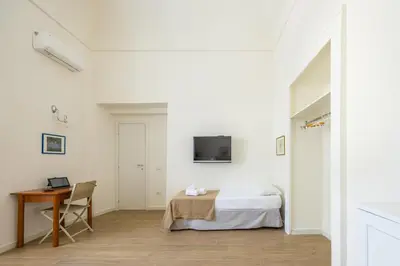 TV o dispositivi per l'intrattenimento presso Terrazza Spaccanapoli By NapoliApartments