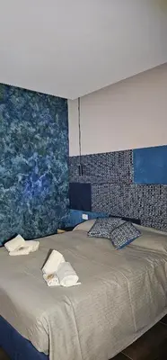 Letto o letti in una camera di Re Lazzarone Suite