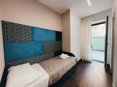 Letto o letti in una camera di Re Lazzarone Suite