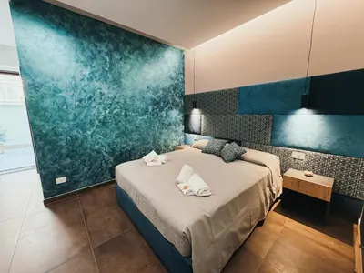 Letto o letti in una camera di Re Lazzarone Suite