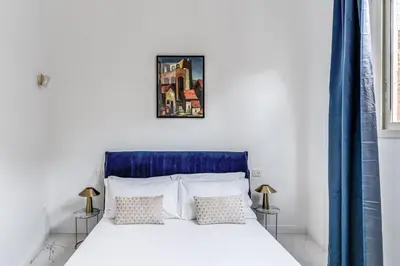 Letto o letti in una camera di Palazzetto Santa Lucia