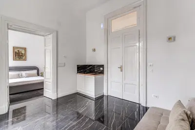 Letto o letti in una camera di Palazzetto Santa Lucia