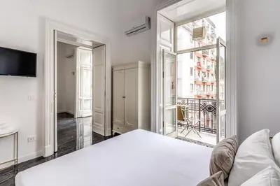 Letto o letti in una camera di Palazzetto Santa Lucia